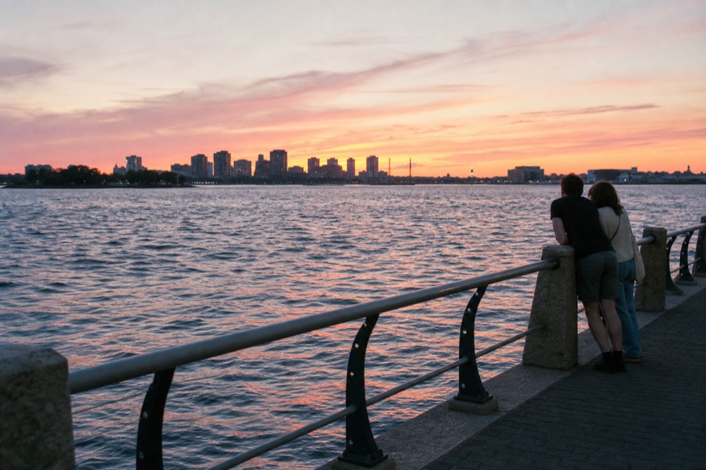 Boston Harbor sunset with city skyline