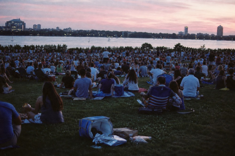 Crowd on the Charles River Esplanade watching fireworks