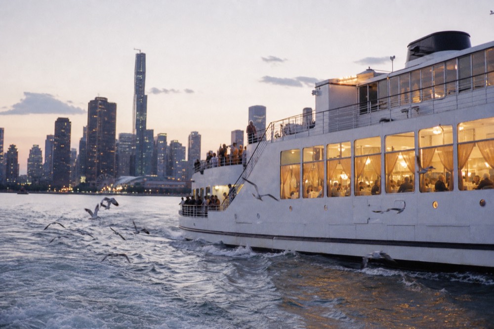 Odyssey dinner cruise on Boston Harbor with city skyline in the background