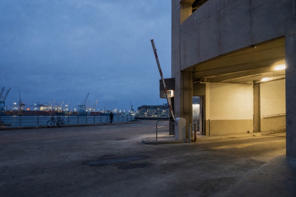 Parking garage entrance near the Boston Seaport waterfront at dusk